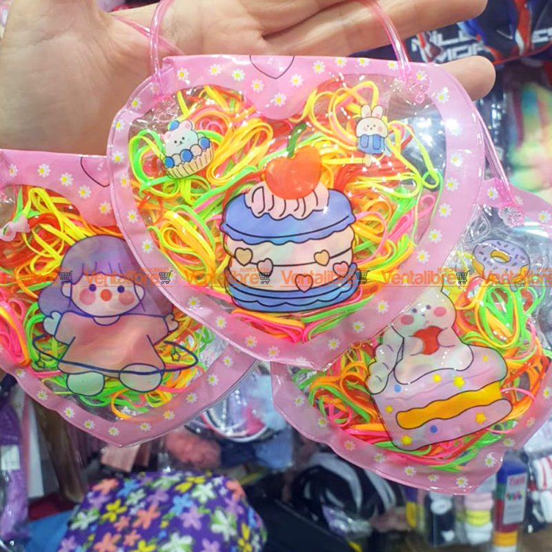 GOMITAS PARA EL PELO EN BOLSITA CON MANIJA COLORES SURTIDOS X 200 UNI.