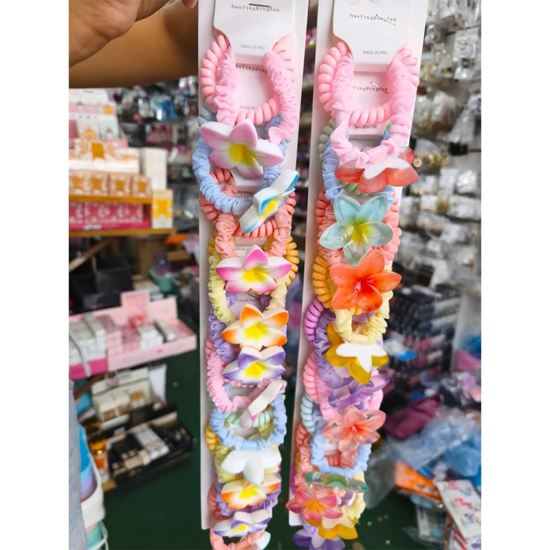 BLISTER DE DOS COLITAS ELASTIZADAS CON FLOR VARIOS COLORES