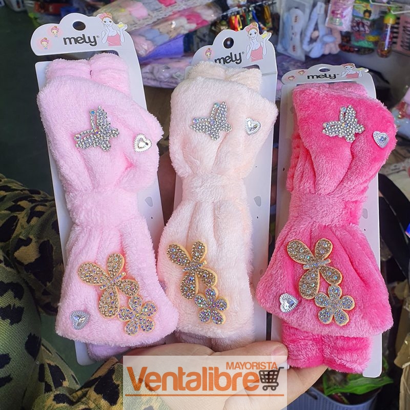 VINCHA ELÁSTICA PELUCHE CON MOÑO MARIPOSAS