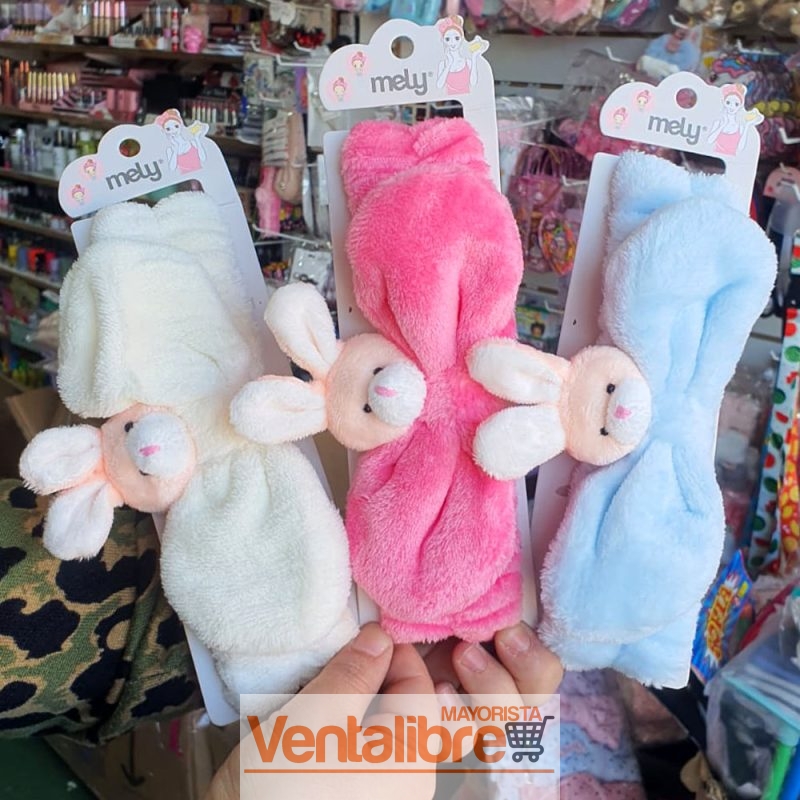VINCHA ELÁSTICA PELUCHE CON MOÑO CONEJITO