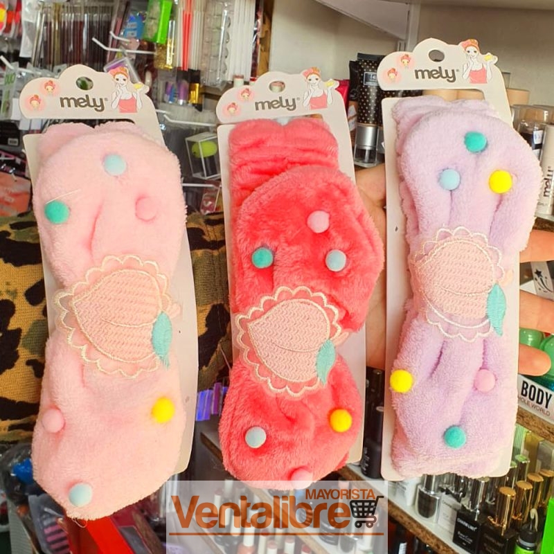 VINCHA ELÁSTICA PELUCHE CON MOÑO PUNTITOS Y BORDADO