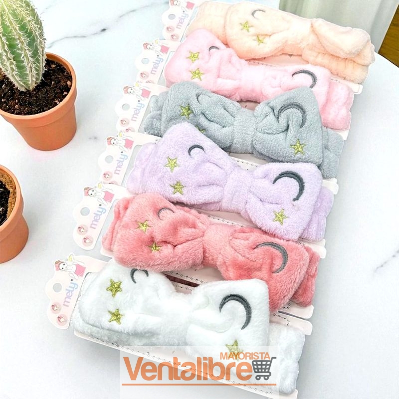 VINCHA ELÁSTICA PELUCHE CON MOÑO LUNITAS Y ESTRELLAS