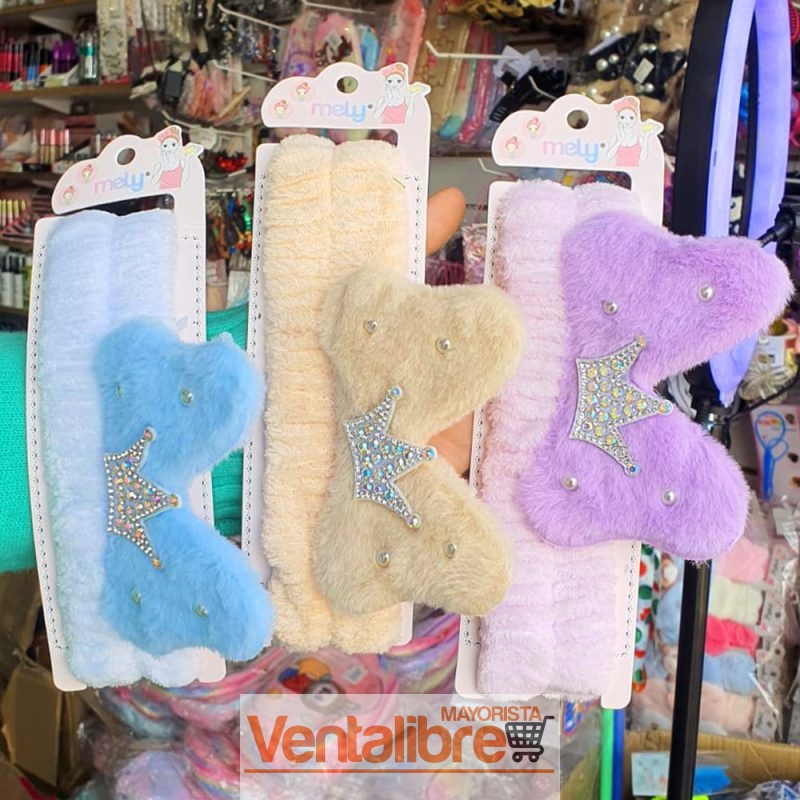 VINCHA ELÁSTICA PELUCHE CON MOÑO CORONA