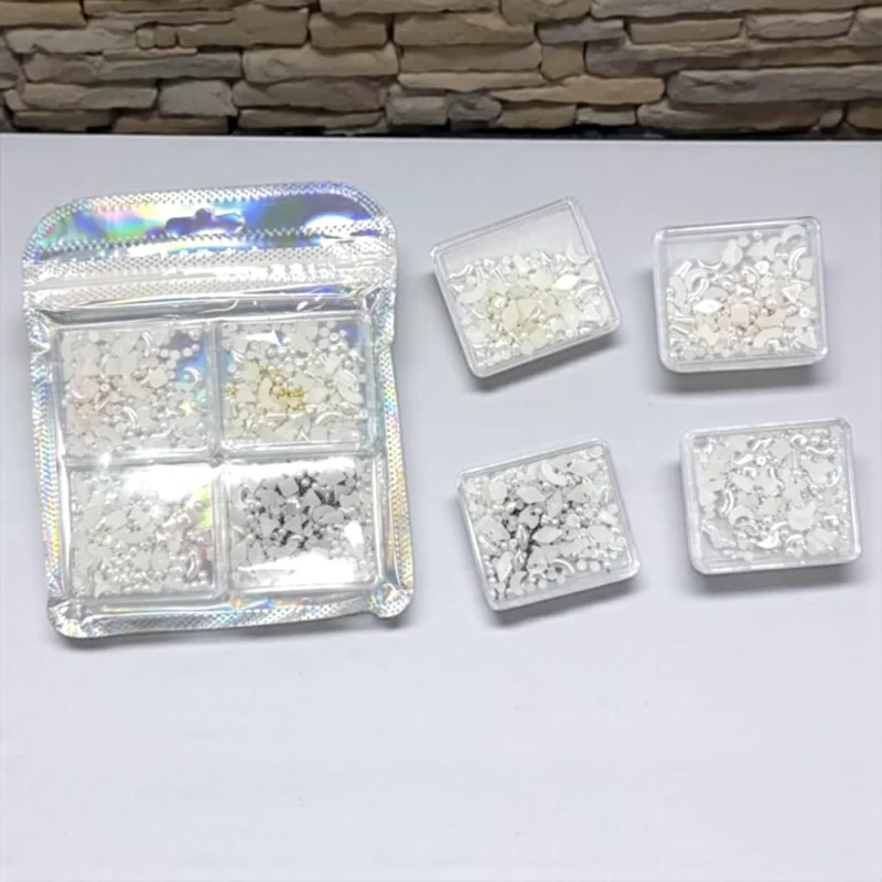 ESTUCHE CON DECORACIONES PARA UÑAS PERLAS Y ESCAMAS