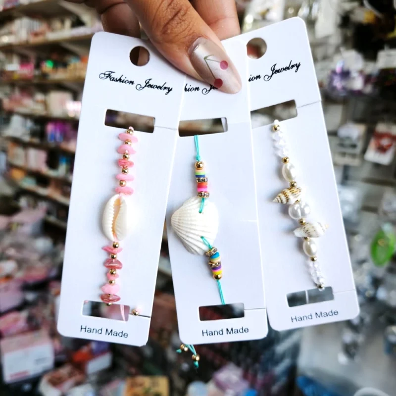 PULSERA EN HILO ARTESANAL CON DISEÑOS CARACOLES