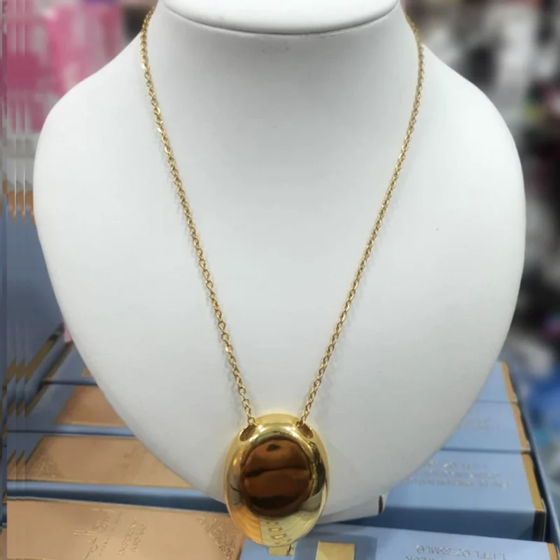 CADENA ACERO QUIRÚRGICO DORADO X 45 CM. CON DIJE OVALO