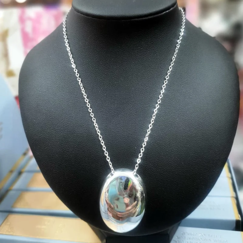 CADENA DE ACERO BLANCO 45 CM. CON DIJE OVAL LISO 32 MM.